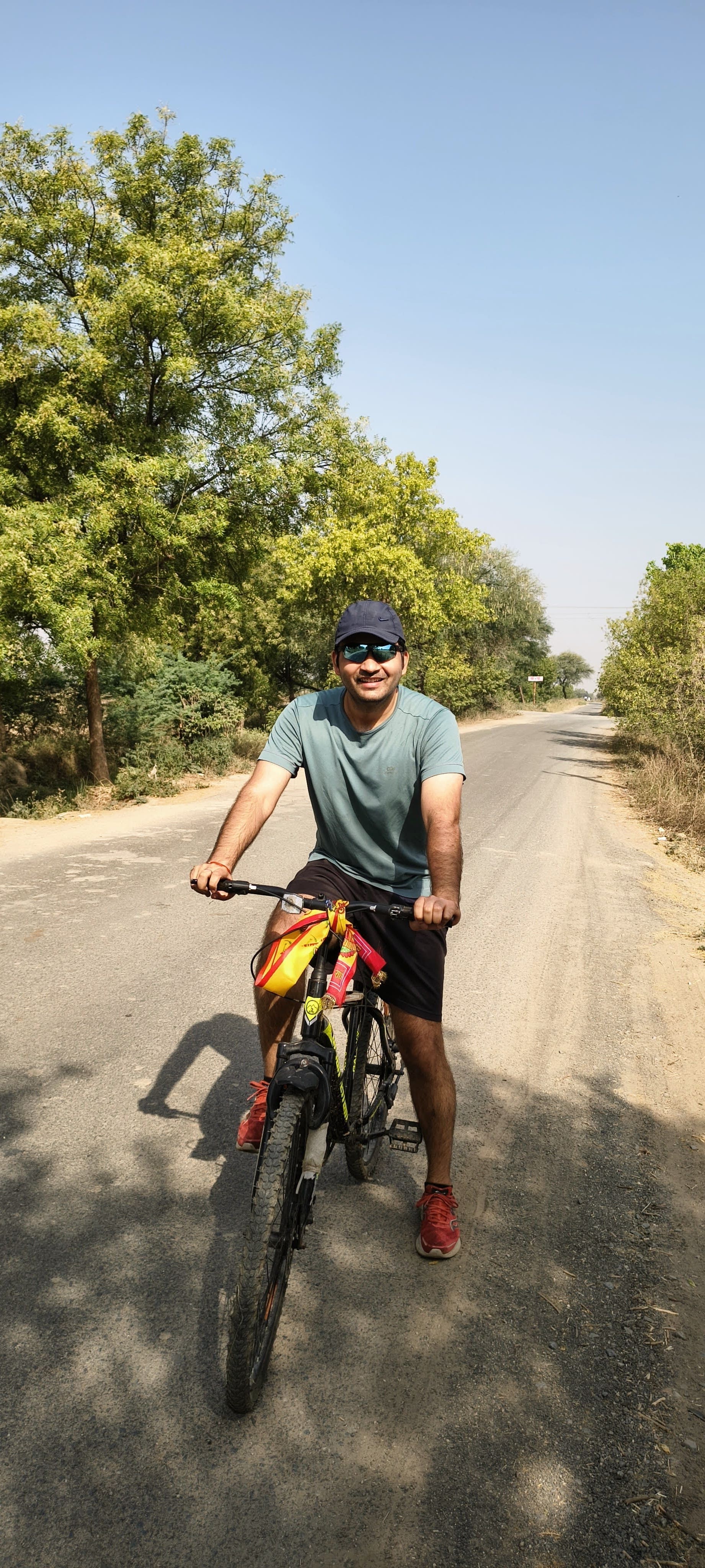 Cyclists riding along coastal road