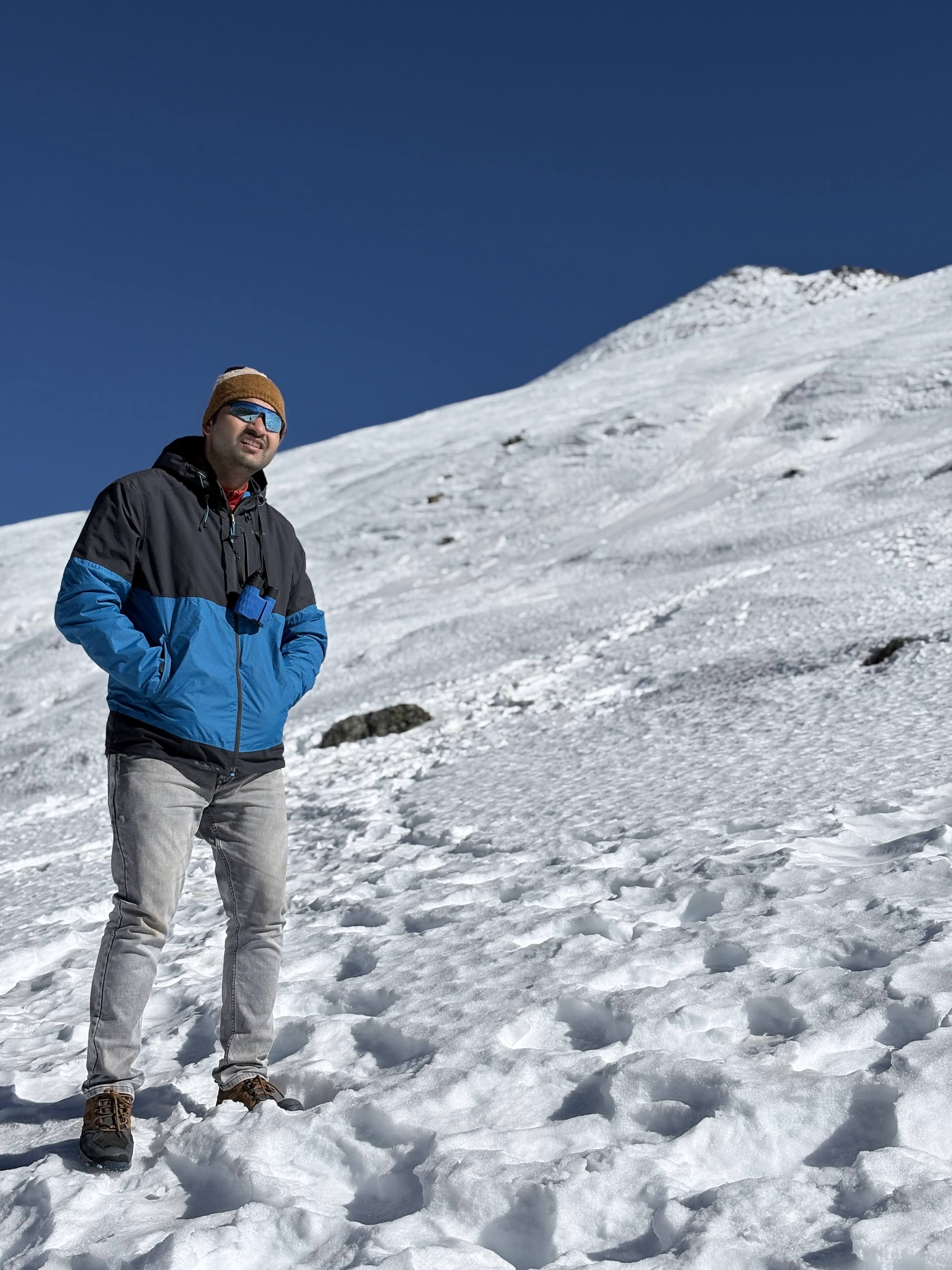 Portrait with backpack on mountain